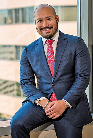 Anthony sitting on window ledge